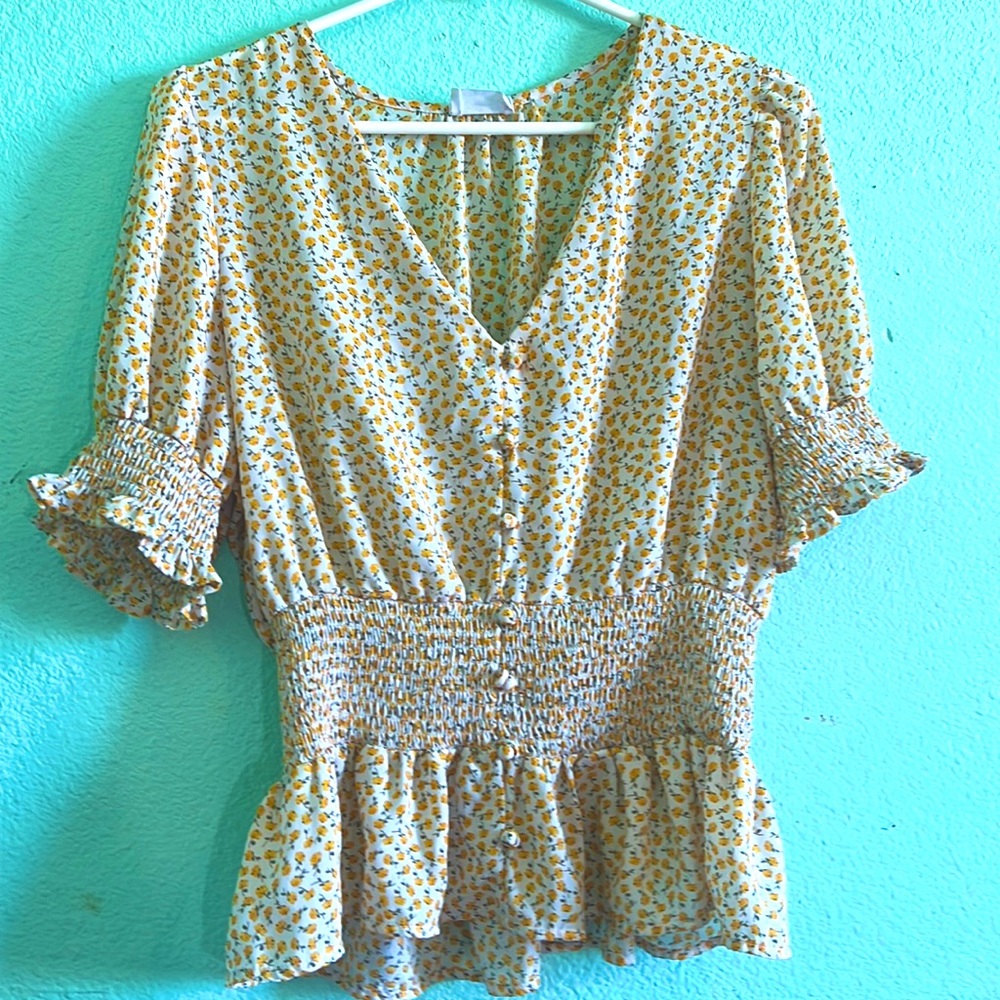 Floral print blouse by sienna sky, v shaped neckline, baby doll top